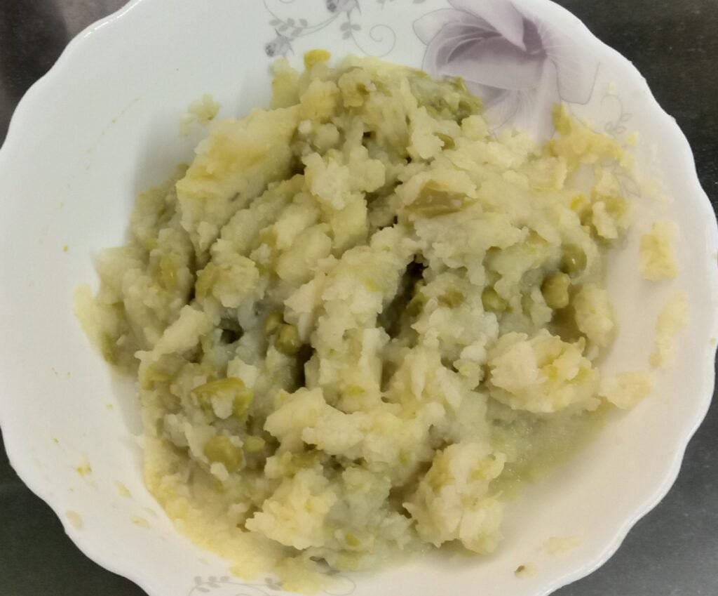 Smashed vegetables in bowl, Pav bhaji recipe.
