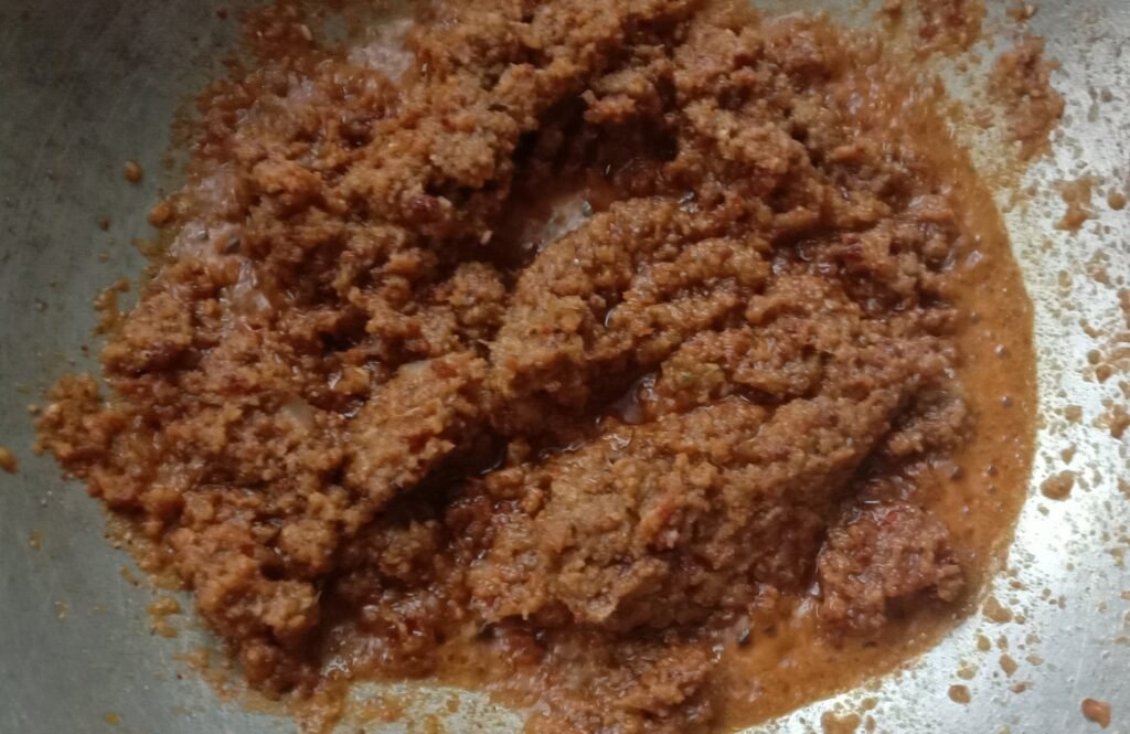 Mixing masala, Chicken kolhapuri curry recipe.