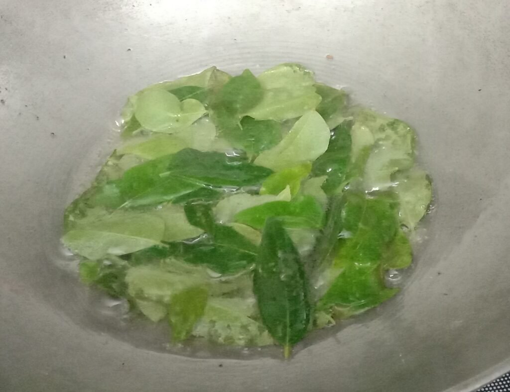 Frying curry leaves, Chivda recipe.