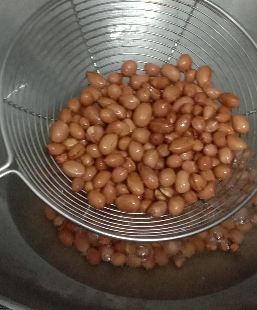 Frying peanuts, Chivda recipe.