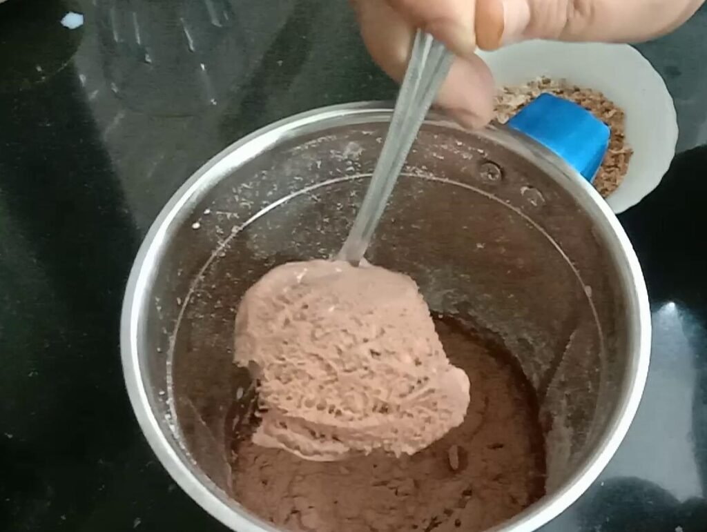 Adding chocolate to mixer, Chocolate milkshake recipe.