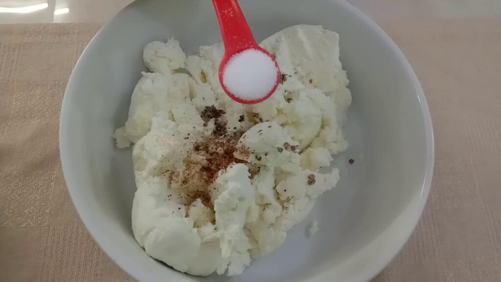 Adding Cardamom, Nutmeg powder and salt to yogurt, Frozen yogurt.