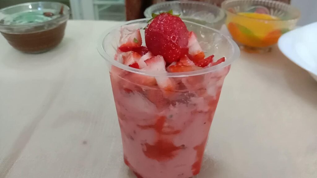 Srtawberry yogurt in serving glass, Frozen yogurt.