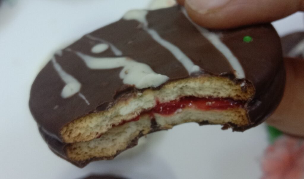 Cookie with jam inside, Chocolate dipped cookies.