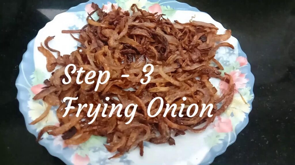 Frying onions, Chicken biryani.