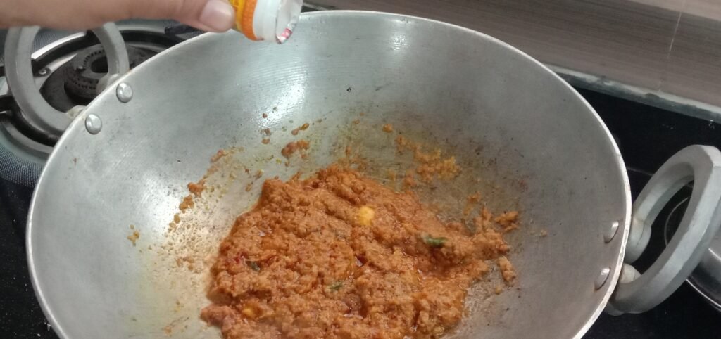 Adding garam masala to kadhai, Bhindi masala recipe.