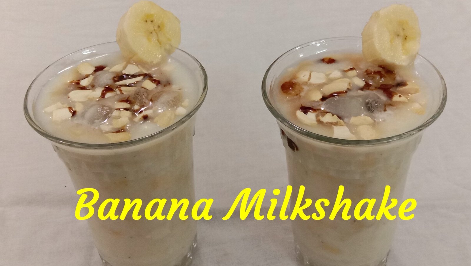 Banana Milkshake with topping in glass, Banana milkshake.