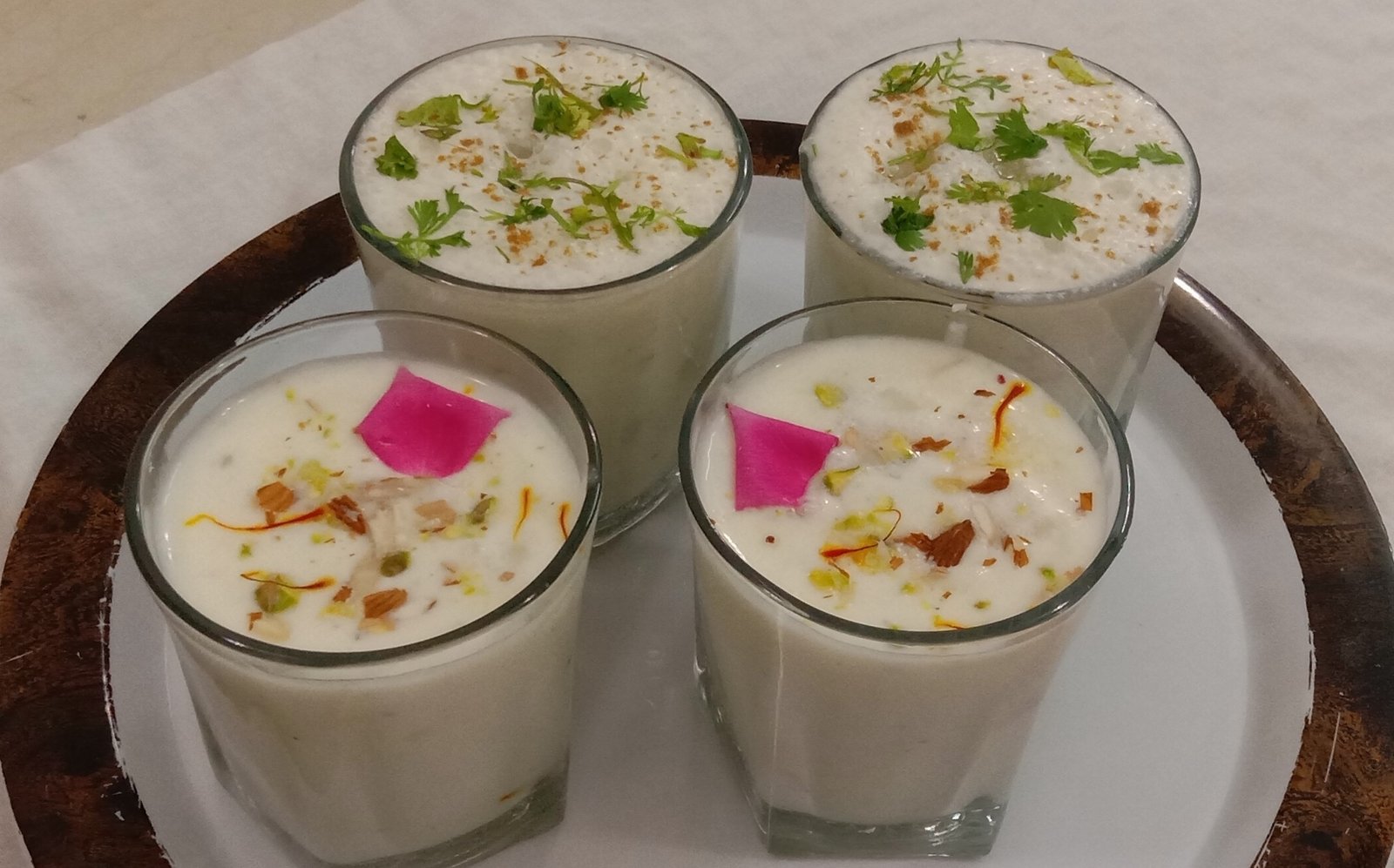 Sweet and masala lassi in 4 glasses,Sweet Lassi and Masala Lassi 
