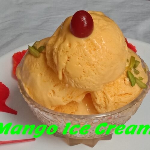 Mango Ice cream in bowl with garnishing, Mango Ice cream.