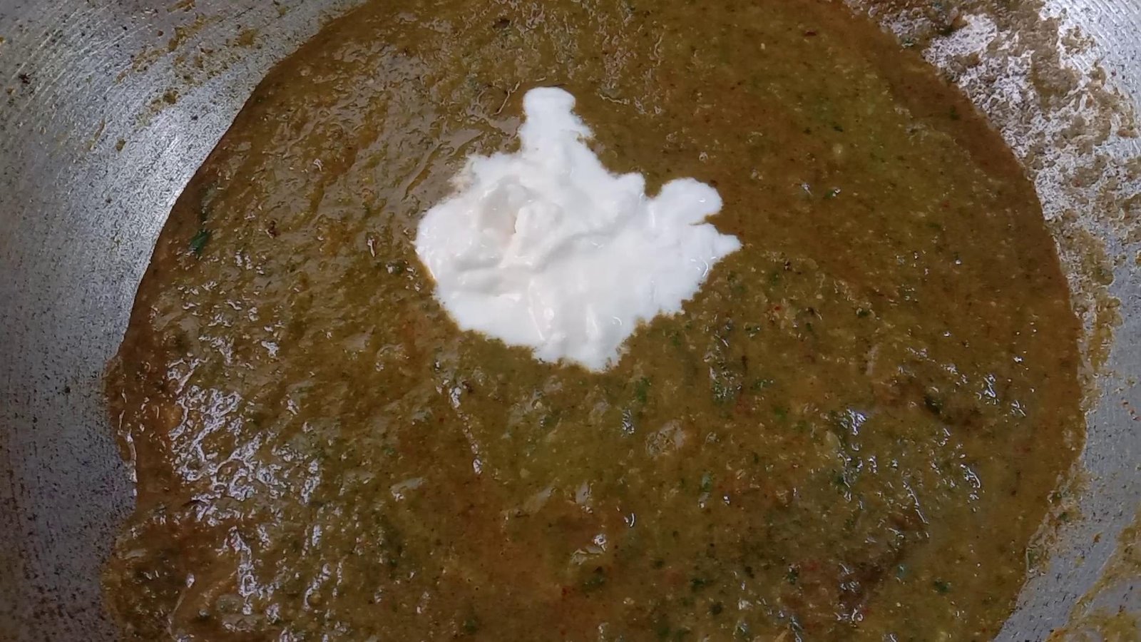 Adding 2 tablespoons fresh cream to paste, Palak paneer-Spinach Paneer