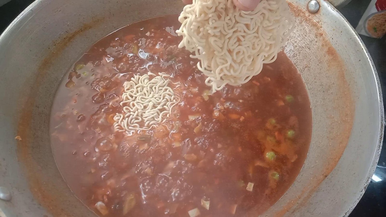 Adding maggi noodles to soup, Maggi noodles recipe. 