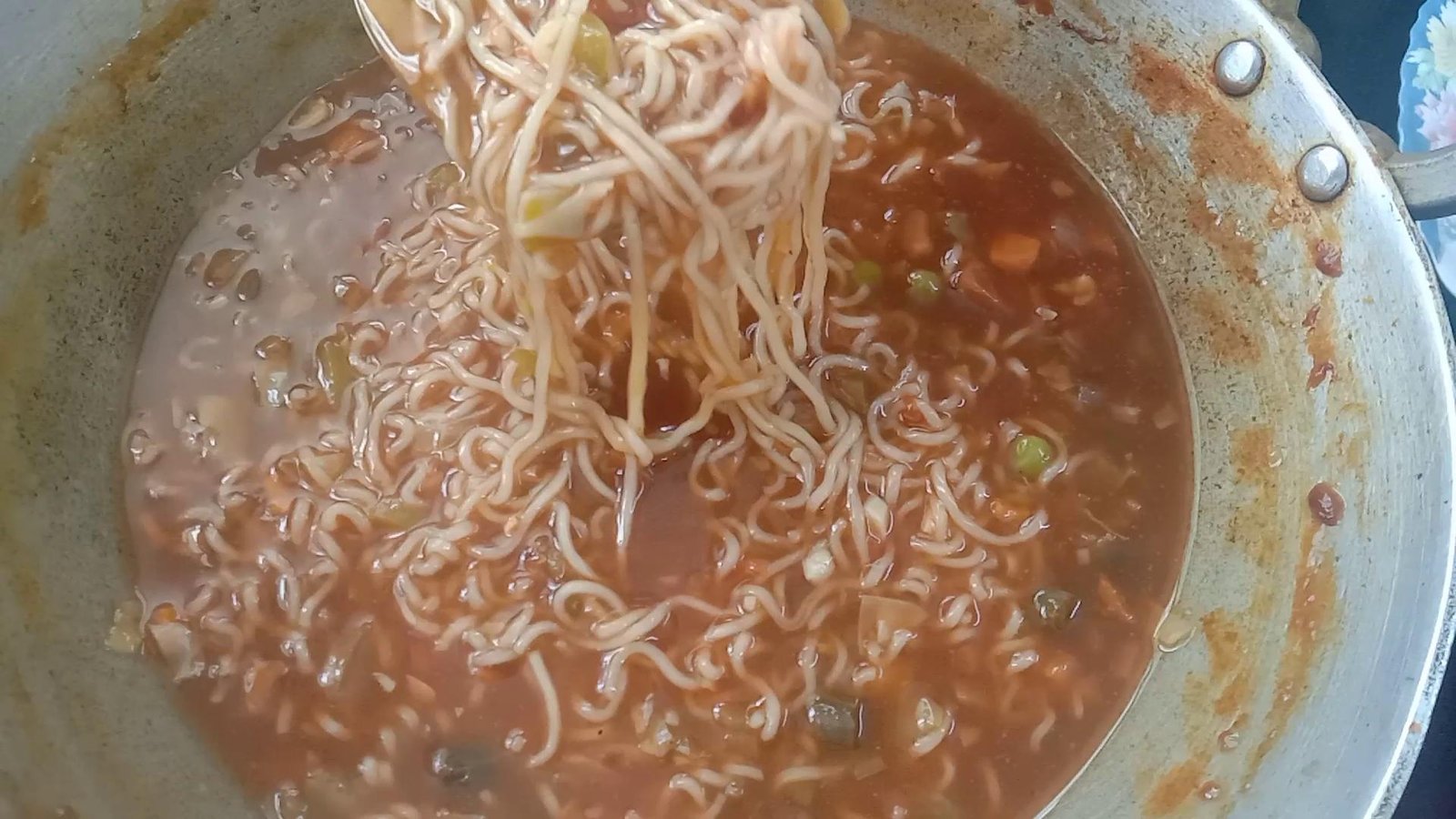 Cooked noodles in soup, Maggi noodles recipe. 