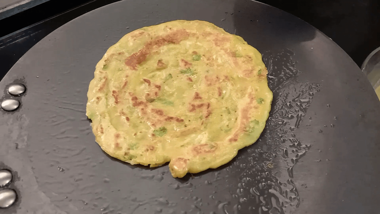 Cooking paratha on one side, Jowar paratha | Healthy Jowar recipe for weight loss.